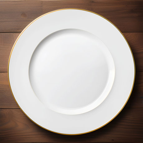 Harmonious Simplicity A Pristine White Plate Resting On Rustic Woodwork